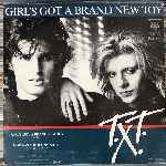 T.X.T.  Girls Got A Brand New Toy  (7", Single)