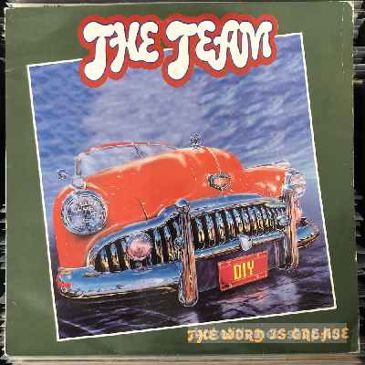 The Team - The Word Is Grease  (12") (vinyl) bakelit lemez